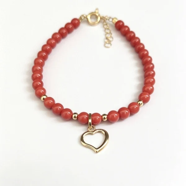 Bracelet Corail Or avec pendentif coeur contour
