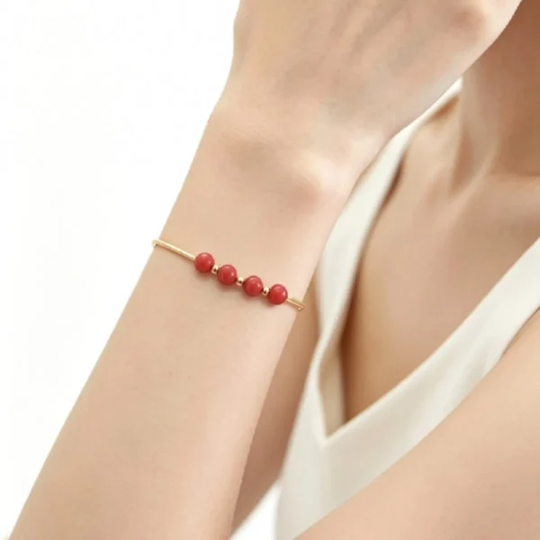 Bracelets or rigide perles rondes corail véritable